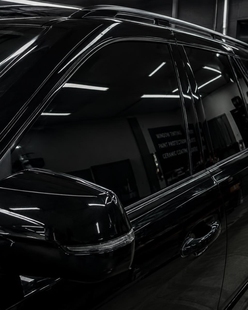 Ceramic window tint on a black SUV
